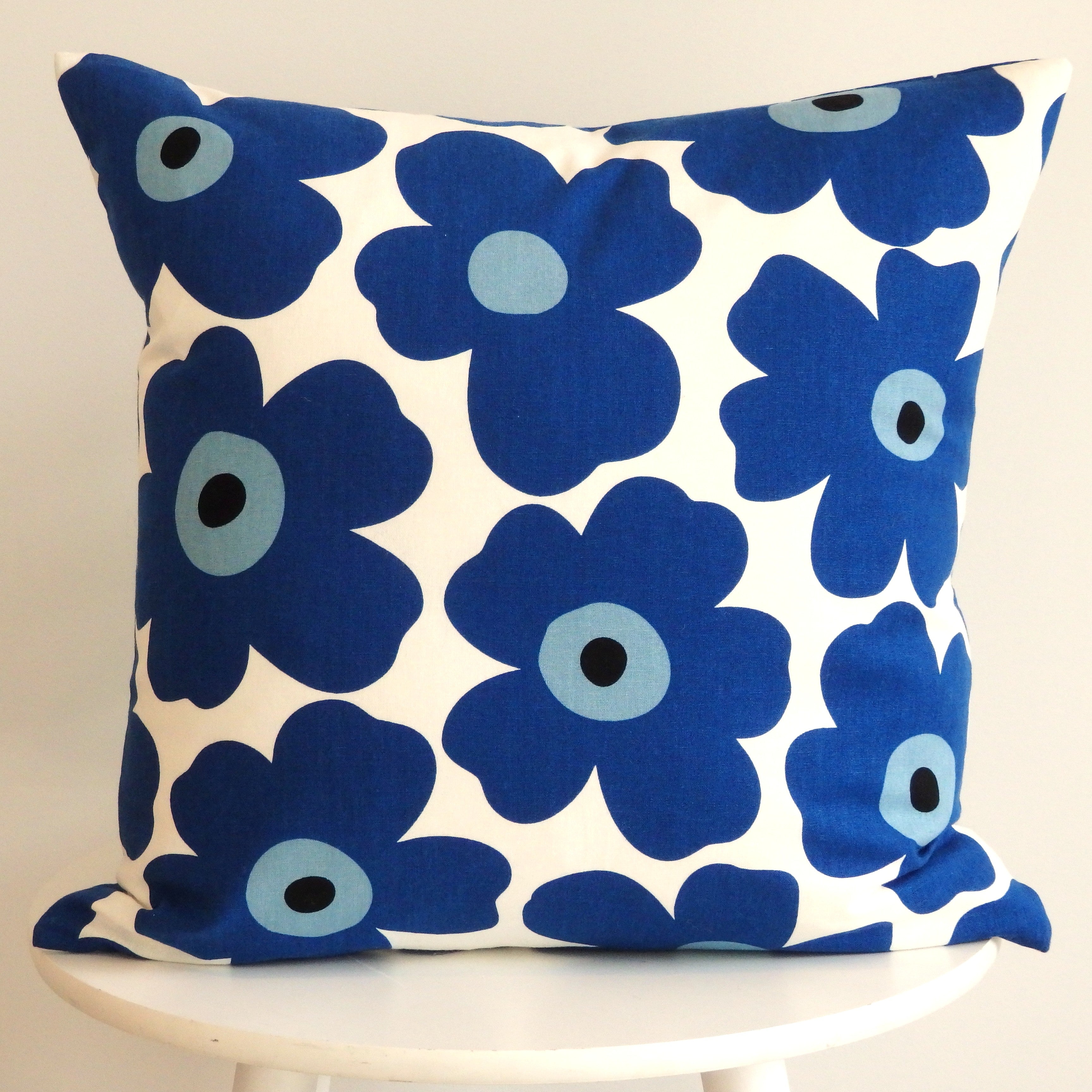 Blue on white poppy cushion cover